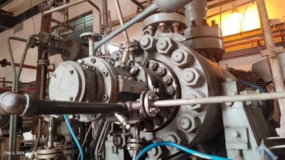 Technician overhauling a multistage centrifugal pump cartridge on site